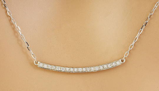 0.20 CTW Diamond 18K White Gold Necklace: 0.20 CTW Diamond 18K White Gold Necklace Manufacturer's Suggested Retail Price: $ 1600.00 Stamped: 18K Total Necklace Weight: 2.7 Grams Necklace Length: 16 Inches Diamond Weight: 0.20 Carat (F-G