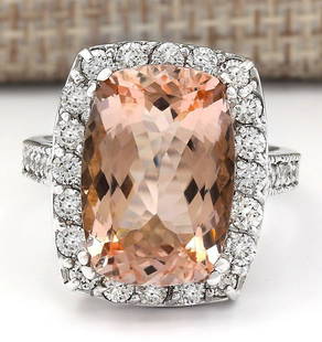 9.60 CTW Natural Morganite And Diamond Ring In 18K White Gold: 9.60 CTW Natural Morganite And Diamond Ring In 18K White Gold Manufacturer's Suggested Retail Price: $ 5700.00 Stamped: 18K Ring Size: 7 Total Ring Weight: 7.5 Grams Diamond Weight: Total
