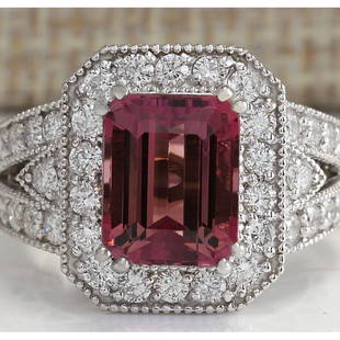 5.78 CTW Natural Pink Tourmaline And Diamond Ring 18K Solid White Gold: 5.78 CTW Natural Pink Tourmaline And Diamond Ring 18K Solid White Gold Manufacturer's Suggested Retail Price: $ 5300.00 Stamped: 18K Ring Size: 6.25 Total Ring Weight: 10.2 Grams Diamond