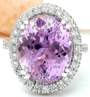 14.07 CTW Natural Kunzite 14K Solid White Gold Diamond Ring: 14.07 CTW Natural Kunzite 14K Solid White Gold Diamond Ring Manufacturer's Suggested Retail Price: $ 4100.00 14.07 Carat Natural Kunzite 14K Solid White Gold Diamond Ring Item Type: Ring 