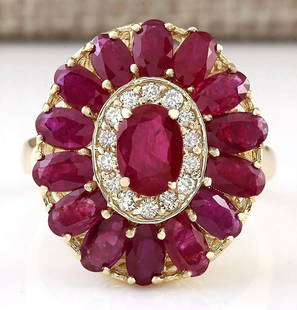 4.42 CTW Natural Ruby And Diamond Ring In 14k Yellow Gold: 4.42 CTW Natural Ruby And Diamond Ring In 14k Yellow Gold Manufacturer's Suggested Retail Price: $ 3000.00 Stamped: 14K Ring Size: 7 Total Ring Weight: 6.3 Grams Diamond Weight: Total