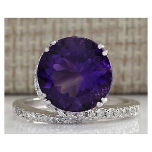 9.22CTW Natural Amethyst And Diamond Ring In 18K Solid White Gold: 9.22CTW Natural Amethyst And Diamond Ring In 18K Solid White Gold Manufacturer's Suggested Retail Price: $ 3300.00 Stamped: 18K Ring Size: 9 Total Ring Weight: 7 Grams Diamond Weight: 