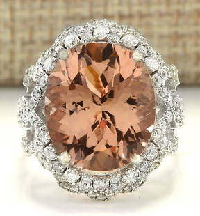 9.80 CTW Natural Morganite And Diamond Ring In 14k White Gold: 9.80 CTW Natural Morganite And Diamond Ring In 14k White Gold Manufacturer's Suggested Retail Price: $ 4700.00 Stamped: 14K Ring Size: 7 Total Ring Weight: 8.6 Grams Diamond Weight: Total