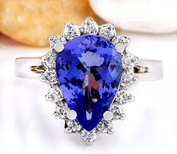 4.07 CTW Natural Tanzanite 18K Solid White Gold Diamond Ring: 4.07 CTW Natural Tanzanite 18K Solid White Gold Diamond Ring Manufacturer's Suggested Retail Price: $ 5200.00 4.07 Carat Natural Tanzanite 18K Solid White Gold Diamond Ring Item Type: Ring 