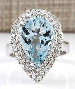 5.37 CTW Natural Aquamarine And Diamond Ring In 14k Solid White Gold: 5.37 CTW Natural Aquamarine And Diamond Ring In 14k Solid White Gold Manufacturer's Suggested Retail Price: $ 3700.00 Stamped: 14K Ring Size: 6.75 Total Ring Weight: 7.5 Grams Diamond