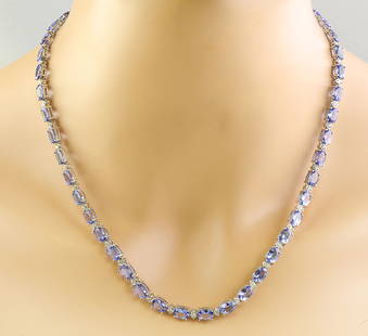 47.30 CTW Tanzanite 14K White Gold Diamond Necklace: 47.30 CTW Tanzanite 14K White Gold Diamond Necklace Manufacturer's Suggested Retail Price: $ 13000.00 Stamped: 14K Total Necklace Weight: 26.4 Grams Necklace Length: 18 Inches Tanzanite Weight: