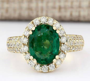 3.46 CTW Natural Emerald And Diamond Ring In 14k Yellow Gold: 3.46 CTW Natural Emerald And Diamond Ring In 14k Yellow Gold Manufacturer's Suggested Retail Price: $ 4900.00 Stamped: 14K Ring Size: 7 Total Ring Weight: 6 Grams Diamond Weight: Total