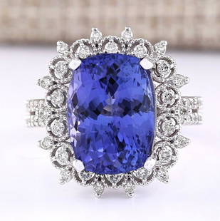 10.30 CTW Natural Blue Tanzanite And Diamond Ring 18K Solid White Gold: 10.30 CTW Natural Blue Tanzanite And Diamond Ring 18K Solid White Gold Manufacturer's Suggested Retail Price: $ 9500.00 Stamped: 18K Ring Size: 6.75 Total Ring Weight: 8.9 Grams Diamond