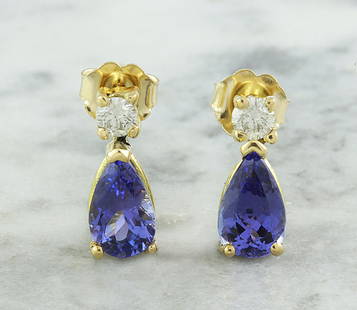 2.25 CTW Tanzanite 14K Yellow Gold Diamond Earrings: 2.25 CTW Tanzanite 14K Yellow Gold Diamond Earrings Manufacturer's Suggested Retail Price: $ 2200.00 Stamped: 14K Total Earrings Weight: 2.5 Grams Tanzanite Weight: 2.00 Carat (7.50x4.90