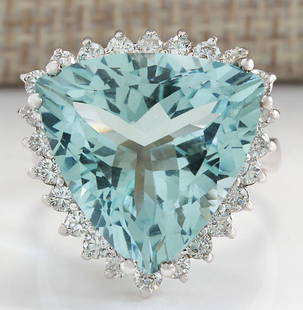 13.62 CTW Natural Aquamarine And Diamond Ring In 14K Solid White Gold: 13.62 CTW Natural Aquamarine And Diamond Ring In 14K Solid White Gold Manufacturer's Suggested Retail Price: $ 4700.00 Stamped: 14K Ring Size: 7 Total Ring Weight: 6.5 Grams Diamond Weight: 