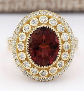 3.70 CTW Natural Pink Tourmaline And Diamond Ring 18K Solid Yellow Gold: 3.70 CTW Natural Pink Tourmaline And Diamond Ring 18K Solid Yellow Gold Manufacturer's Suggested Retail Price: $ 3900.00 Stamped: 18K Ring Size: 6.25 Total Ring Weight: 6.5 Grams Diamond