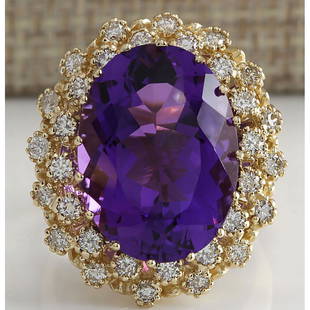 12.11 CTW Natural Amethyst And Diamond Ring In 14K Solid Yellow Gold: 12.11 CTW Natural Amethyst And Diamond Ring In 14K Solid Yellow Gold Manufacturer's Suggested Retail Price: $ 3900.00 Stamped: 14K Ring Size: 6.75 Total Ring Weight: 9.5 Grams Diamond