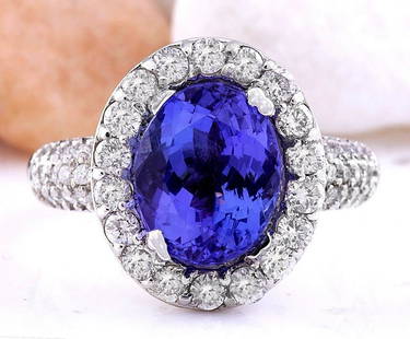 5.24 CTW Natural Tanzanite 18K Solid White Gold Diamond Ring: 5.24 CTW Natural Tanzanite 18K Solid White Gold Diamond Ring Manufacturer's Suggested Retail Price: $ 5600.00 5.24 Carat Natural Tanzanite 18K Solid White Gold Diamond Ring Item Type: Ring 