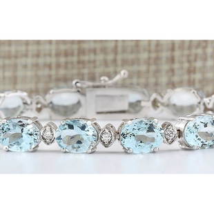 25.755 CTW Natural Aquamarine Diamond Bracelet In 18K Solid White Gold: 25.755 CTW Natural Aquamarine Diamond Bracelet In 18K Solid White Gold Manufacturer's Suggested Retail Price: $ 7400.00 Stamped: 18K Bracelet Width: 6.95mm Bracelet Length: 7.0 Inches 