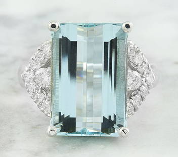 10.10 CTW Aquamarine 18K White Diamond Ring: 10.10 CTW Aquamarine 18K White Diamond Ring Manufacturer's Suggested Retail Price: $ 5100.00 Stamped: 18K Total Ring Weight: 8.6 Grams Aquamarine Weight 9.60 Carat (15.65x10.65 Millimeters)