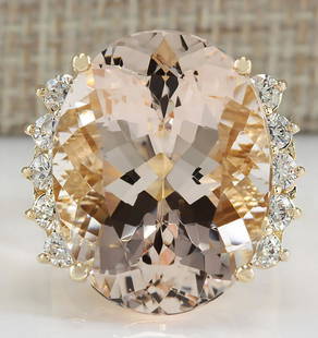 24.99 CTW Natural Morganite And Diamond Ring In 14K Yellow Gold: 24.99 CTW Natural Morganite And Diamond Ring In 14K Yellow Gold Manufacturer's Suggested Retail Price: $ 7700.00 Stamped: 14K Ring Size: 6.5 Total Ring Weight: 8.5 Grams Diamond Weight: 