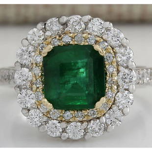 2.88CTW Natural Emerald And Diamond Ring 14K Solid Two-Tone Gold: 2.88CTW Natural Emerald And Diamond Ring 14K Solid Two-Tone Gold Manufacturer's Suggested Retail Price: $ 4600.00 Stamped: 14K Ring Size: 6.75 Total Ring Weight: 6.5 Grams Diamond Weight: 