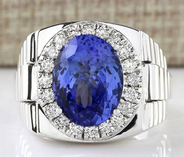 9.44 CTW Natural Mens Tanzanite And Diamond Ring 18K Solid White Gold: 9.44 CTW Natural Mens Tanzanite And Diamond Ring 18K Solid White Gold Manufacturer's Suggested Retail Price: $ 10000.00 Stamped: 18K Ring Size: 11 Total Ring Weight: 16.5 Grams Diamond