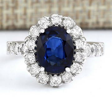 3.35 CTW Natural Blue Sapphire And Diamond Ring In 14k White Gold: 3.35 CTW Natural Blue Sapphire And Diamond Ring In 14k White Gold Manufacturer's Suggested Retail Price: $ 4100.00 Stamped: 14K Ring Size: 4.75 Total Ring Weight: 5.7 Grams Diamond Weight: 