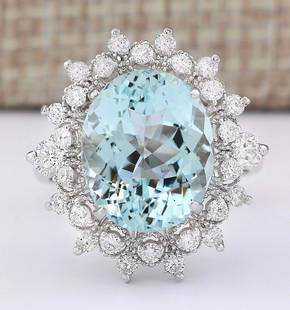 7.73 CTW Natural Aquamarine And Diamond Ring In 14k White Gold: 7.73 CTW Natural Aquamarine And Diamond Ring In 14k White Gold Manufacturer's Suggested Retail Price: $ 4400.00 Stamped: 14K Ring Size: 6.75 Total Ring Weight: 6.2 Grams Diamond Weight: 