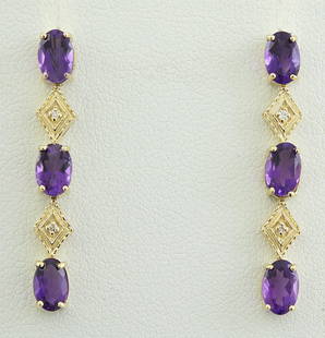 2.65 CTW Amethyst 18K Yellow Gold Diamond Earrings: 2.65 CTW Amethyst 18K Yellow Gold Diamond Earrings Manufacturer's Suggested Retail Price: $ 1300.00 Stamped: 18K Total Earrings Weight: 1.6 Grams Amethyst Weight: 2.60 Carat (6.00x4.00