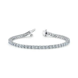 Natural 2.95 CTW Diamond Bracelet 14K White Gold: Natural 2.95 CTW Diamond Bracelet 14K White Gold Manufacturer's Suggested Retail Price: $5600.00 Product Type: Diamond Bracelet Stone1 Type: 72 Diamonds @ 2.95 CTW Stone1 Color: G Stone1 Clarity: