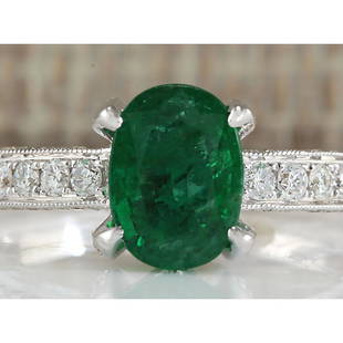 2.11 CTW Natural Emerald And Diamond Ring In 14K White Gold: 2.11 CTW Natural Emerald And Diamond Ring In 14K White Gold Manufacturer's Suggested Retail Price: $ 3500.00 Stamped: 14K Ring Size: 7 Total Ring Weight: 4.7 Grams Diamond Weight: Total