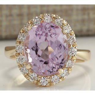 7.06 CTW Natural Kunzite And Diamond Ring 18K Solid Yellow Gold: 7.06 CTW Natural Kunzite And Diamond Ring 18K Solid Yellow Gold Manufacturer's Suggested Retail Price: $ 3200.00 Stamped: 18K Ring Size: 6.75 Total Ring Weight: 6.2 Grams Diamond Weight: 
