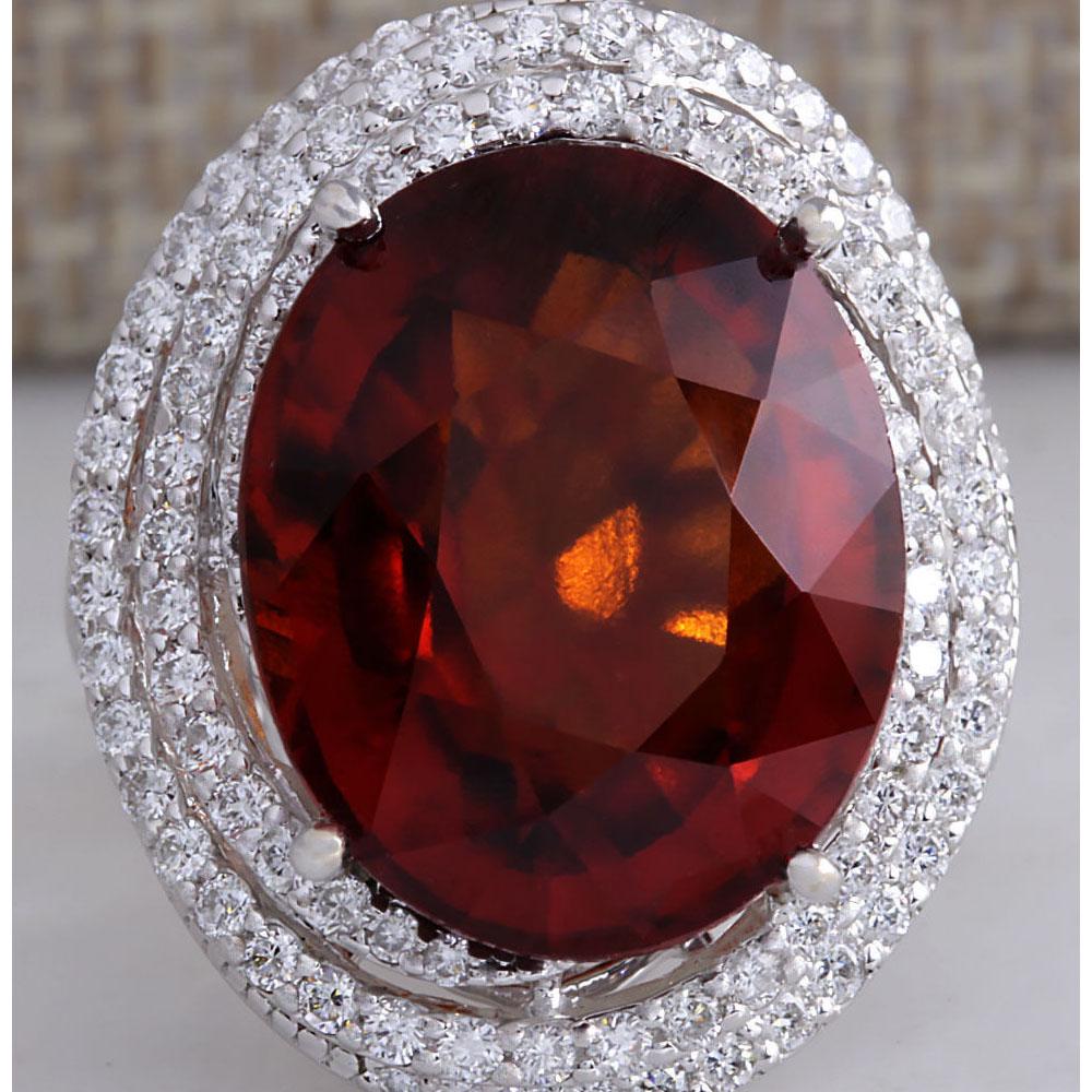 20.25CTW Natural Hessonite Garnet And Diamond Ring In 14K White Gold: 20.25CTW Natural Hessonite Garnet And Diamond Ring In 14K White Gold Manufacturer's Suggested Retail Price: $ 8900.00 Stamped: 14K Ring Size: 6.75 Total Ring Weight: 13.2 Grams Diamond Weight: Total N