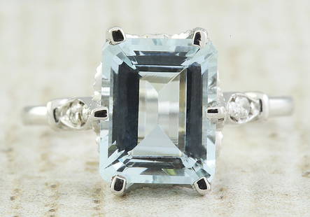 2.60 CTW Aquamarine 18K White Gold Diamond Ring: 2.60 CTW Aquamarine 18K White Gold Diamond Ring Manufacturer's Suggested Retail Price: $ 2300.00 Stamped: 18K Total Ring Weight: 3.8 Grams Aquamarine Weight: 2.45 Carat (10.20x8.70