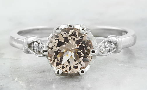 1.45 CTW Morganite 14K White Gold Diamond Ring: 1.45 CTW Morganite 14K White Gold Diamond Ring Manufacturer's Suggested Retail Price: $ 1500.00 Stamped: 14K Total Ring Weight: 3.4 Grams Morganite Weight 1.35 Carat (6.80x6.80 Millimeters)