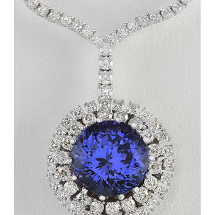 22.09 CTW Natural Tanzanite And Diamond Necklace In 18K White Gold: 22.09 CTW Natural Tanzanite And Diamond Necklace In 18K White Gold Manufacturer's Suggested Retail Price: $ 39100.00 Stamped: 18K Total Necklace Weight: 33Grams Diamond Weight: Total