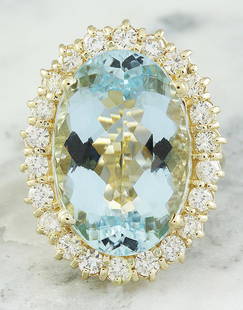 14.00 CTW Aquamarine 18K Yellow Gold Diamond Ring: 14.00 CTW Aquamarine 18K Yellow Gold Diamond Ring Manufacturer's Suggested Retail Price: $ 6400.00 Stamped: 18K Total Ring Weight: 7.5 Grams Aquamarine Weight 12.60 Carat (19.65x13.45