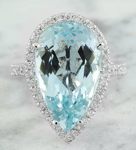 9.93 CTW Aquamarine 18K White Gold Diamond Ring: 9.93 CTW Aquamarine 18K White Gold Diamond Ring Manufacturer's Suggested Retail Price: $ 5100.00 Stamped: 18K Total Ring Weight: 6 Grams Aquamarine Weight: 9.23 Carat (19.00x11.30 Millimeters)