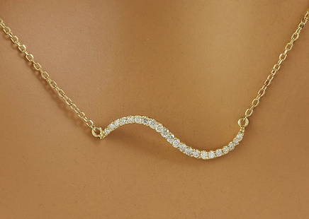0.25 CTW Diamond 14K Yellow Gold Necklace: 0.25 CTW Diamond 14K Yellow Gold Necklace Manufacturer's Suggested Retail Price: $ 1400.00 Stamped: 14K Total Necklace Weight: 2.1 Grams Necklace Length: 16 Inches Diamond Weight: 0.25 Carat