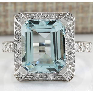 5.83 CTW Natural Blue Aquamarine Diamond Ring 14K Solid White Gold: 5.83 CTW Natural Blue Aquamarine Diamond Ring 14K Solid White Gold Manufacturer's Suggested Retail Price: $ 3300.00 Stamped: 14K Ring Size: 6.75 Total Ring Weight: 7 Grams Diamond Weight: 