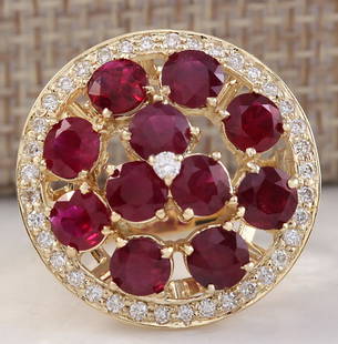 4.93 CTW Natural Red Ruby And Diamond Ring 18K Solid Yellow Gold: 4.93 CTW Natural Red Ruby And Diamond Ring 18K Solid Yellow Gold Manufacturer's Suggested Retail Price: $ 3200.00 Stamped: 18K Ring Size: 6.5 Total Ring Weight: 8.5 Grams Diamond Weight: 