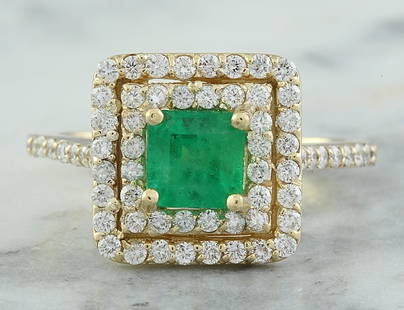 1.55 CTW Emerald 18K Yellow Gold Diamond Ring: 1.55 CTW Emerald 18K Yellow Gold Diamond Ring Manufacturer's Suggested Retail Price: $ 3600.00 Stamped: 18K Ring Size: 7 Total Ring Weight: 4.2 Grams Emerald Weight: 0.85 Carat (5.60x5.60