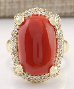 12.69 CTW Natural Coral And Diamond Ring In 14k Yellow Gold: 12.69 CTW Natural Coral And Diamond Ring In 14k Yellow Gold Manufacturer's Suggested Retail Price: $ 6600.00 Stamped: 14K Ring Size: 7.25 Total Ring Weight: 12.3 Grams Diamond Weight: 
