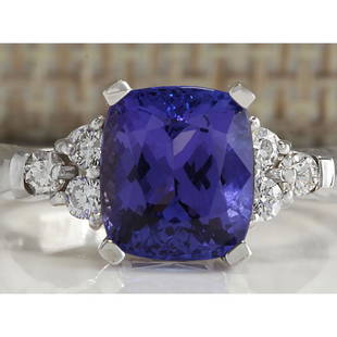 3.49 CTW Natural Blue Tanzanite And Diamond Ring 18K Solid White Gold: 3.49 CTW Natural Blue Tanzanite And Diamond Ring 18K Solid White Gold Manufacturer's Suggested Retail Price: $ 4100.00 Stamped: 18K Ring Size: 6.25 Total Ring Weight: 4.7 Grams Diamond