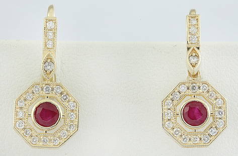 1.60 CTW Ruby 14K Yellow Gold Diamond Errings: 1.60 CTW Ruby 14K Yellow Gold Diamond Errings Manufacturer's Suggested Retail Price: $ 2700.00 Stamped: 14K Total Earrings Weight: 4.5 Grams Ruby Weight: 1.00 Carat (4.20x4.20 Millimeters) 