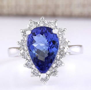 4.07 CTW Natural Blue Tanzanite And Diamond Ring 14k Solid White Gold: 4.07 CTW Natural Blue Tanzanite And Diamond Ring 14k Solid White Gold Manufacturer's Suggested Retail Price: $ 4600.00 Stamped: 14K Ring Size: 6.5 Total Ring Weight: 5.2 Grams Diamond