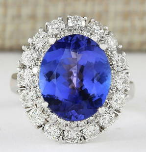 7.38 CTW Natural Blue Tanzanite And Diamond Ring 14k Solid White Gold: 7.38 CTW Natural Blue Tanzanite And Diamond Ring 14k Solid White Gold Manufacturer's Suggested Retail Price: $ 7100.00 Stamped: 14K Ring Size: 6.75 Total Ring Weight: 6.1 Grams Diamond