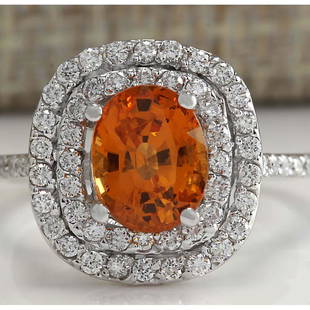 3.13 CTW Natural Orange Sapphire And Diamond Ring In14k White Gold: 3.13 CTW Natural Orange Sapphire And Diamond Ring In14k White Gold Manufacturer's Suggested Retail Price: $ 4600.00 Ring Size: 5.5 Total Ring Weight: 3.9 Grams Diamond Weight: Total Natural