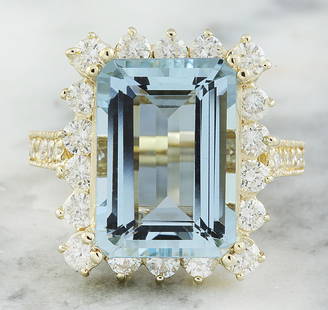 8.75 CTW Aquamarine 14K Yellow Gold Diamond Ring: 8.75 CTW Aquamarine 14K Yellow Gold Diamond Ring Manufacturer's Suggested Retail Price: $ 4900.00 Stamped: 14K Total Ring Weight: 6.8 Grams Aquamarine Weight 7.27 Carat (14.60x10.30