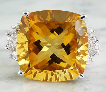 25.60 CTW Citrine 14K White Gold Diamond Ring: 25.60 CTW Citrine 14K White Gold Diamond Ring Manufacturer's Suggested Retail Price: $ 3200.00 Stamped: 14K Total Ring Weight: 13 Grams Citrine Weight 25.00 Carat (17.00x17.00 Millimeters)