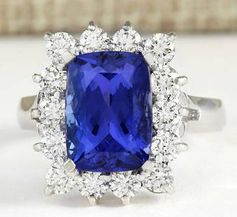 5.88tw Natural Blue Tanzanite And Diamond Ring 14k Solid White Gold: 5.88tw Natural Blue Tanzanite And Diamond Ring 14k Solid White Gold Manufacturer's Suggested Retail Price: $ 6600.00 Stamped: 14K Ring Size: 6.75 Total Ring Weight: 6.4 Grams Diamond Weight: