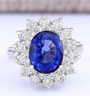 5.55 CTW Natural Ceylon Sapphire And Diamond Ring In 18K White Gold: 5.55 CTW Natural Ceylon Sapphire And Diamond Ring In 18K White Gold Manufacturer's Suggested Retail Price: $ 14700.00 Stamped: 18K Ring Size: 5 Total Ring Weight: 5 Grams Diamond Weight: 