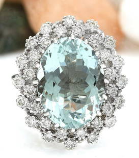 9.41 CTW Natural Aquamarine 18K Solid White Gold Diamond Ring: 9.41 CTW Natural Aquamarine 18K Solid White Gold Diamond Ring Manufacturer's Suggested Retail Price: $ 5700.00 9.41 Carat Natural Aquamarine 18K Solid White Gold Diamond Ring Item Type: Ring 