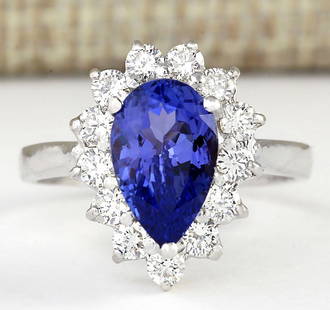 2.58 CTW Natural Blue Tanzanite And Diamond Ring 14k Solid White Gold: 2.58 CTW Natural Blue Tanzanite And Diamond Ring 14k Solid White Gold Manufacturer's Suggested Retail Price: $ 3500.00 Stamped: 14K Ring Size: 5.75 Total Ring Weight: 4.2 Grams Diamond